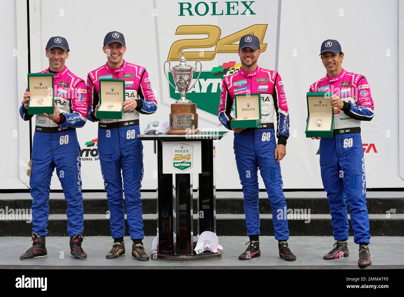 Klik appel gelijktijdig Winners of the Rolex 24 hour auto race, from left, Simon Pagenaud, of France, Colin Braun, Tom Blomqvist and Helio Castroneves, of Brazil show off their Rolex watches in Victory Lane at Klik appel gelijktijdig Winners of the Rolex 24 hour auto race, from left, Simon Pagenaud, of France, Colin Braun, Tom Blomqvist and Helio Castroneves, of Brazil show off their Rolex watches in Victory Lane at