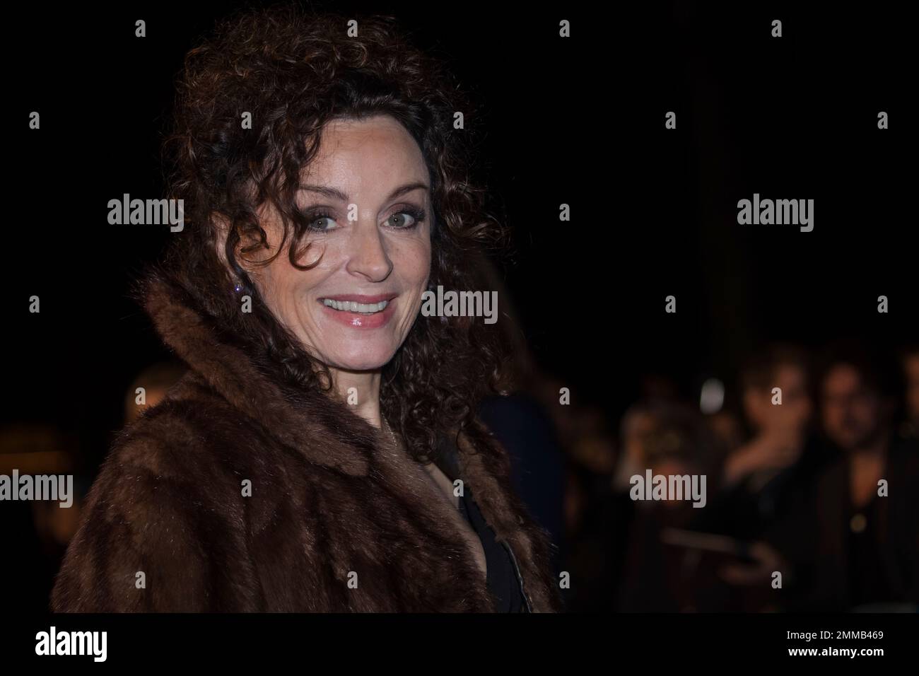 Gillian Berrie poses for photographers upon arrival at the premiere of