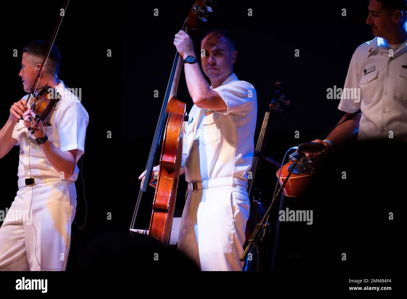 Musician 1st Class Danny Stewart, from Laceyville, Pa., plays bass with