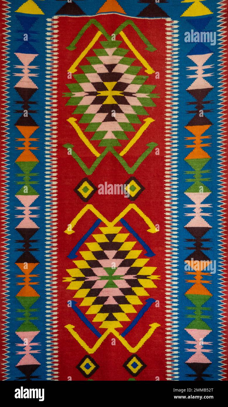 Fabric with multicolor ornaments Stock Photo