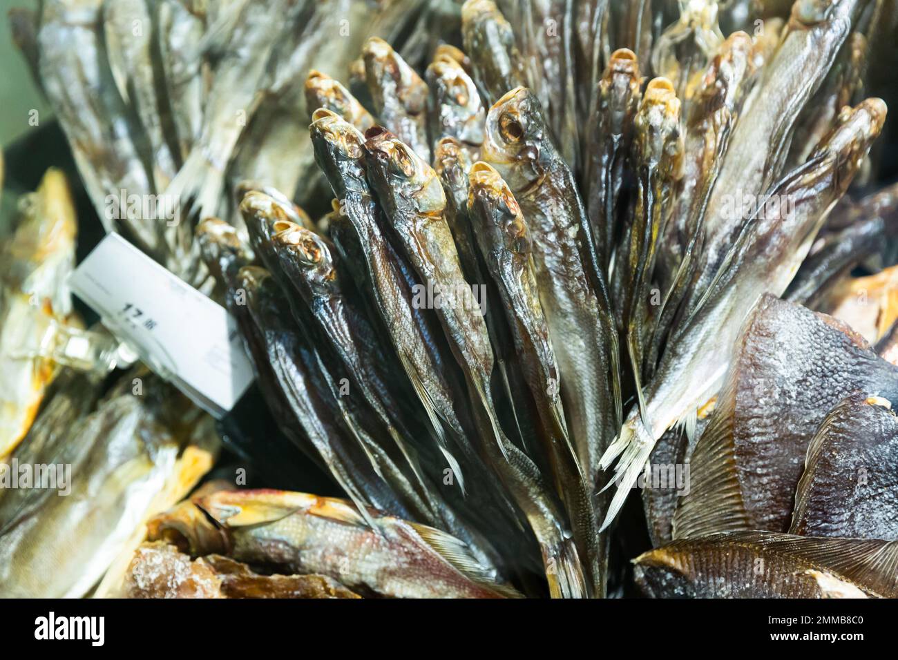 Cured herring and other fish in supermarket Stock Photo Alamy