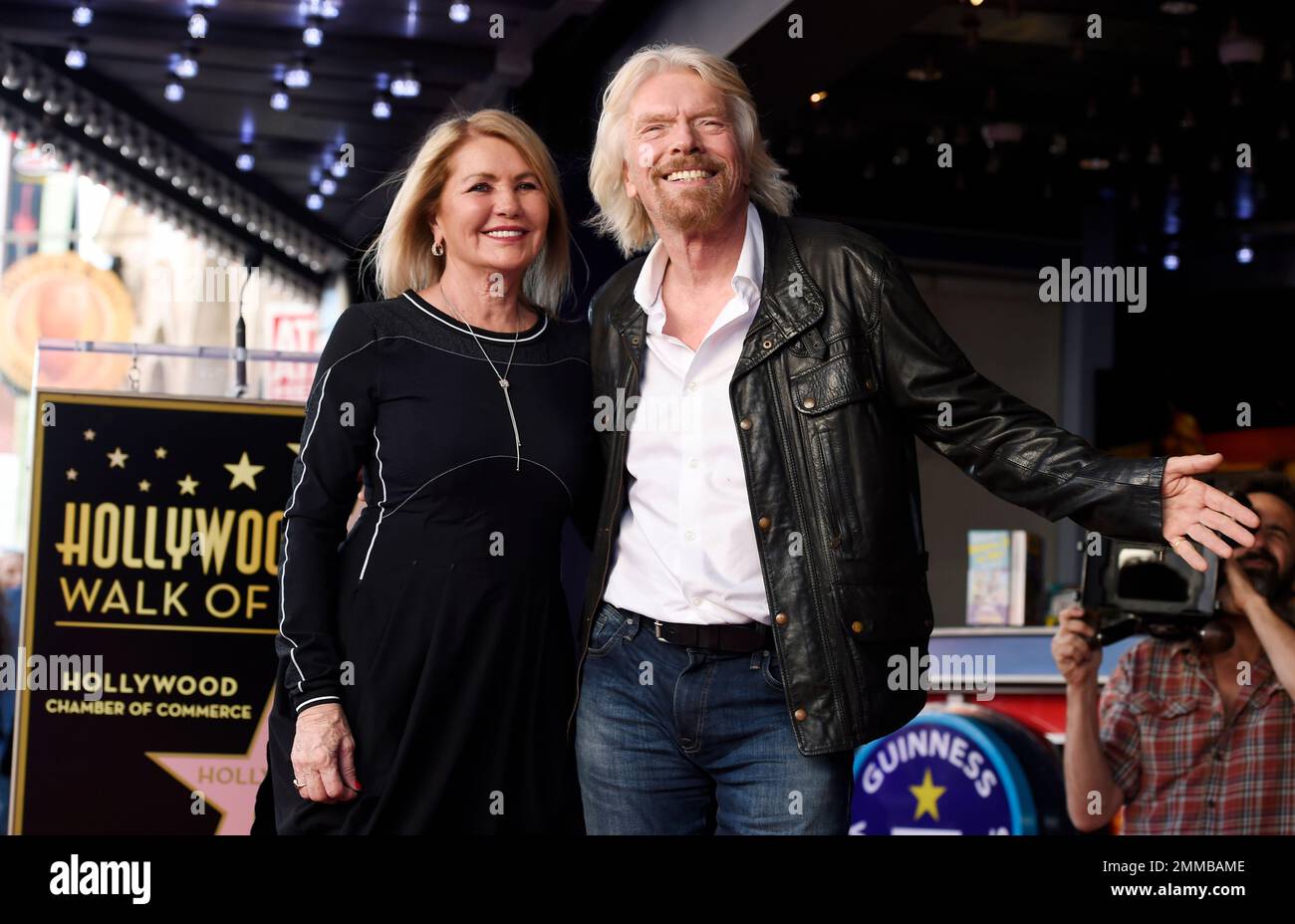 British business magnate Richard Branson, right, poses with his wife