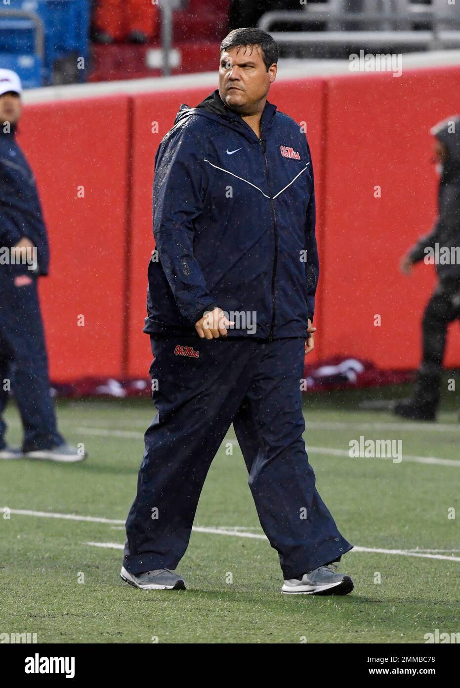 Mississippi coach Matt Luke works with his team before playing Arkansas