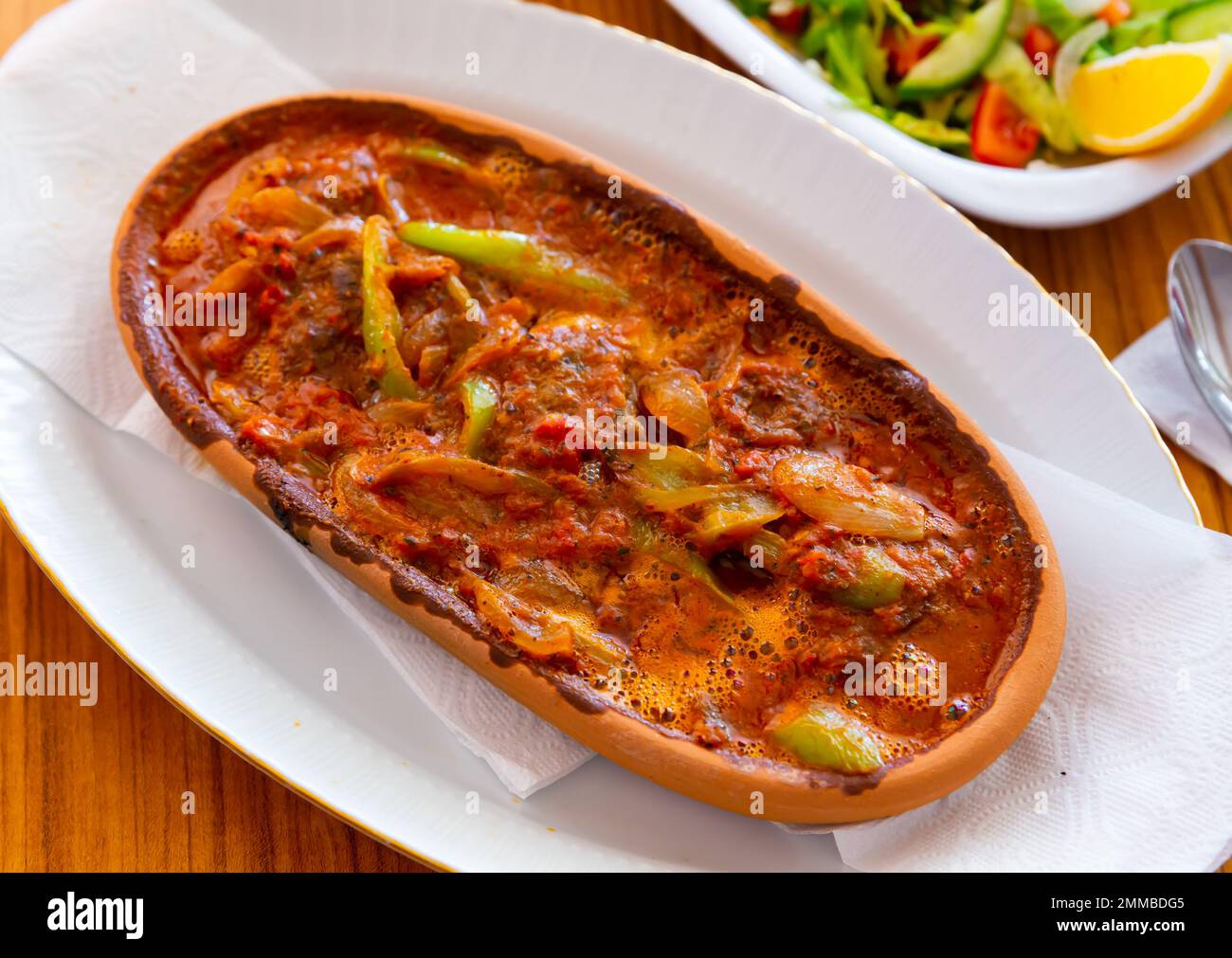 Izmir kofte, turkish dish of spicy meatballs Stock Photo - Alamy