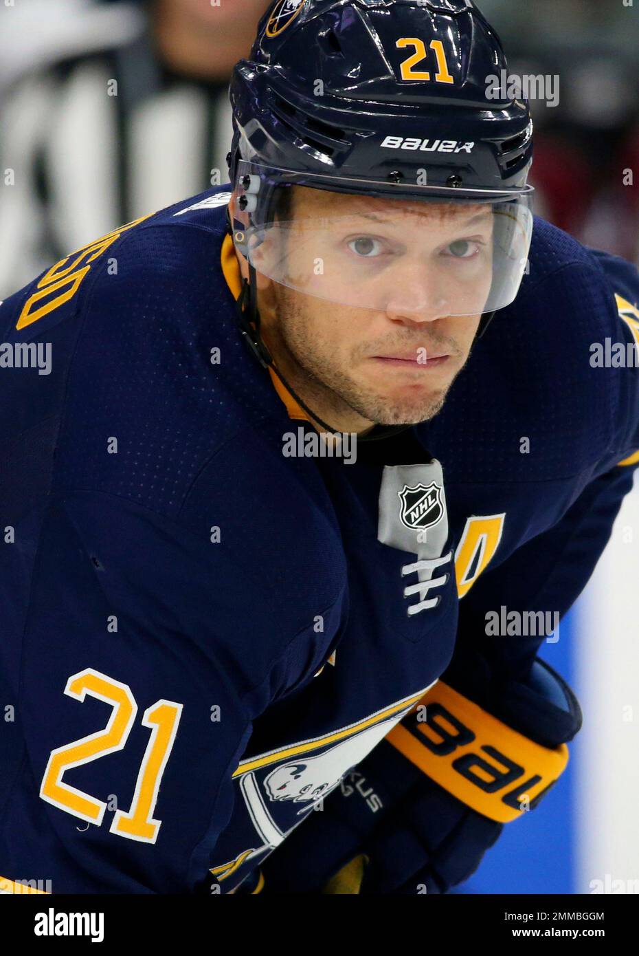 Buffalo Sabres right wing Kyle Okposo (21) skates wearing a Hockey Fights Cancer  jersey prior to the first period of an NHL hockey game against the Seattle  Kraken, Monday, Nov. 29, 2021