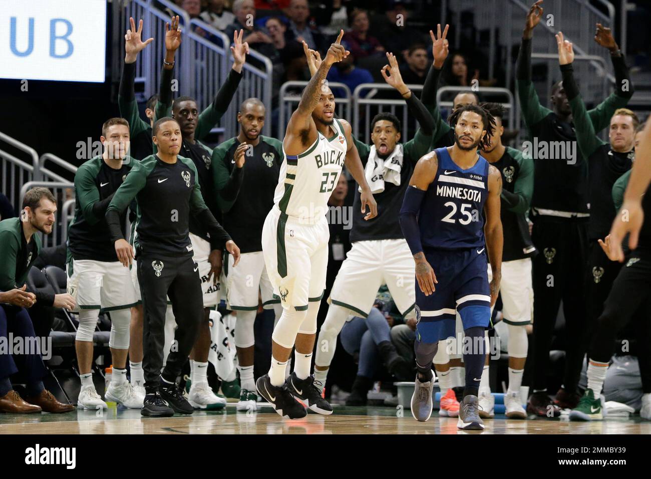 Milwaukee Bucks guard Sterling Brown and the Bucks bench celebrate a ...