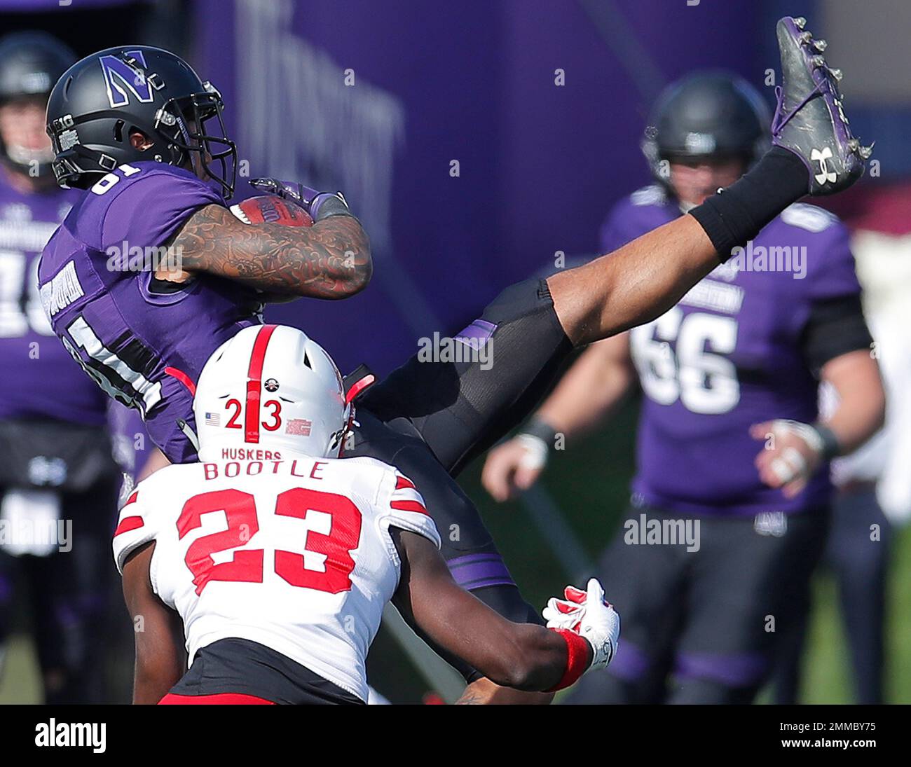 Northwestern's Ramaud ChiaokhiaoBowman, top, makes a catch next to