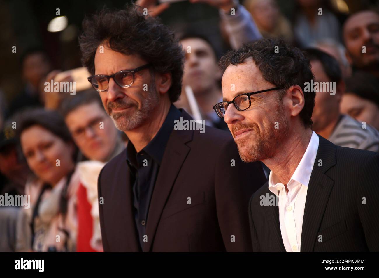 Film directors Ethan Cohen, right, and Joel Cohen pose for