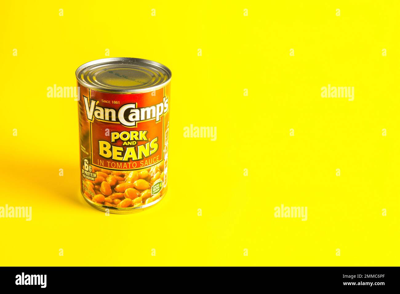 tin of Van Camps Pork and Beans Baked Beans stand out  on a yellow background Stock Photo