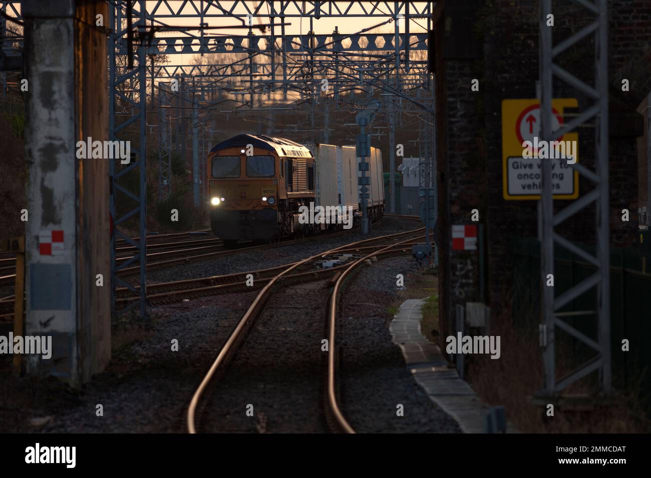 GB Railfreight class 66 diesel 66733 hauling an intermodal