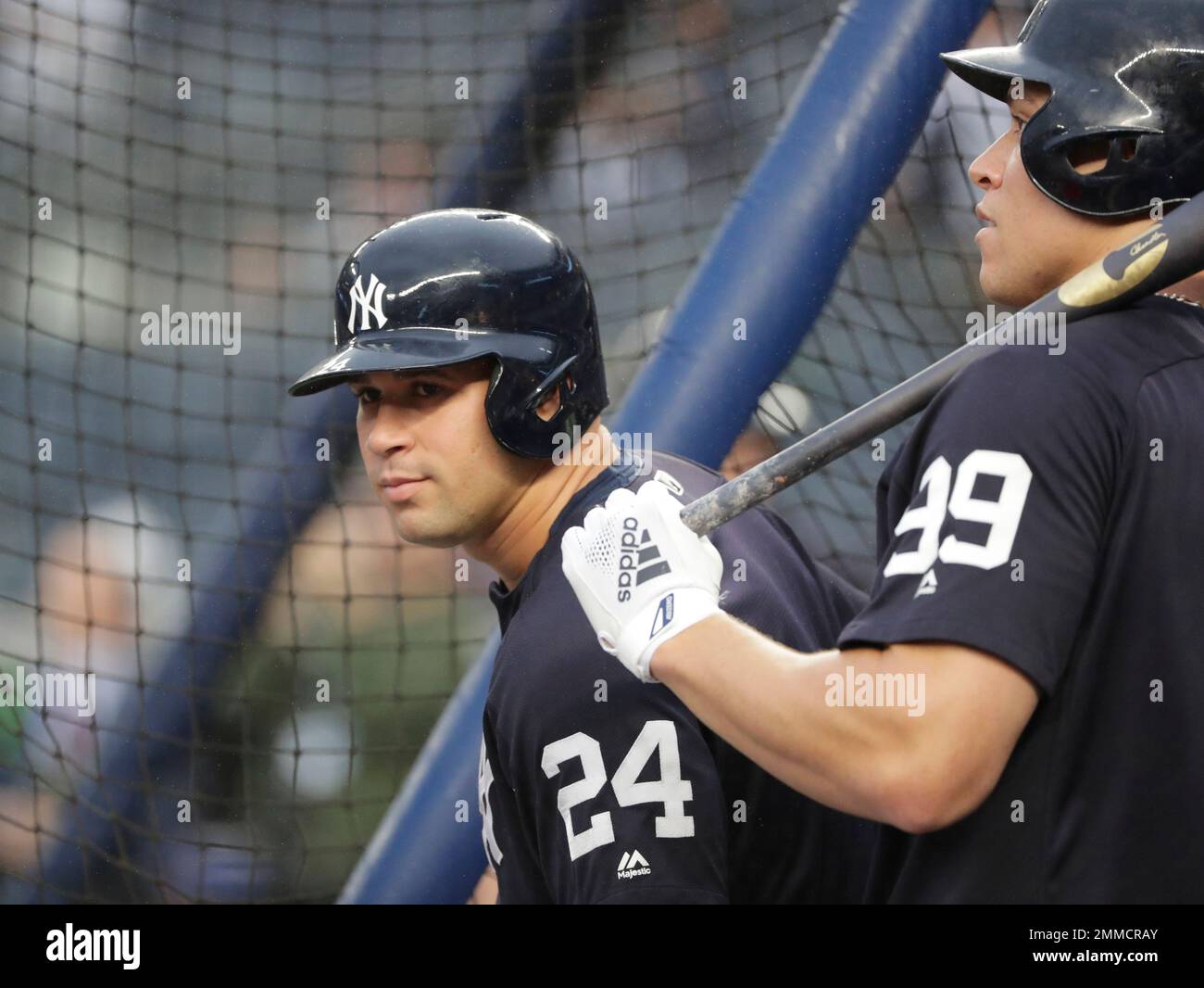 New York Yankees' Gary Sanchez (24) and Aaron Judge wait to take