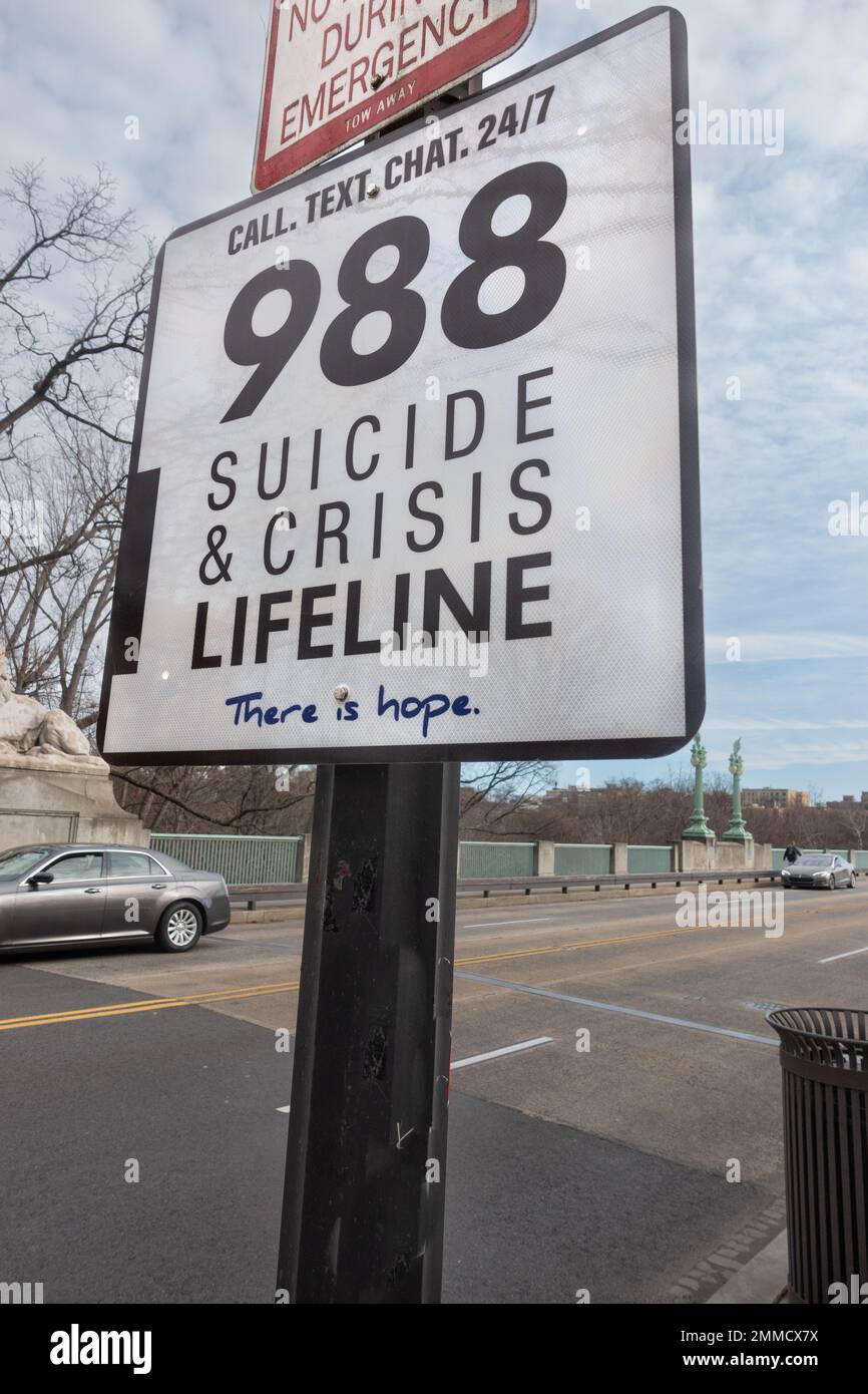 Jan. 28, 2023. Washington, DC - Suicide and Crisis hotline sign at Taft Bridge, to encourage anyone in crisis to call the national 988 hotline. There were 13 suicides from this bridge between Jan. 2010 and June 2020. Stock Photo