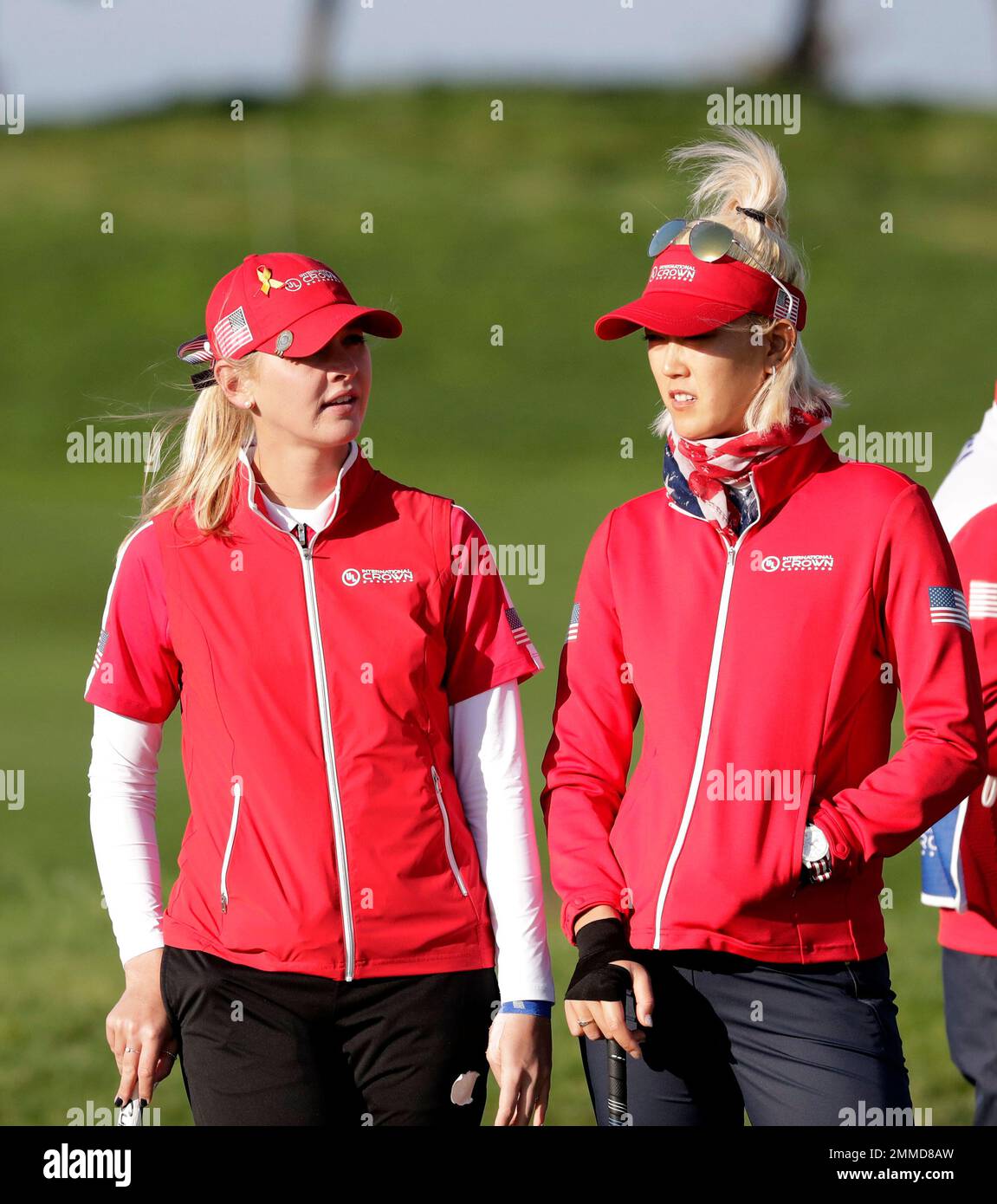 Jessica Korda of the United States, left, talks with Michelle Wie of the United States on 17th
