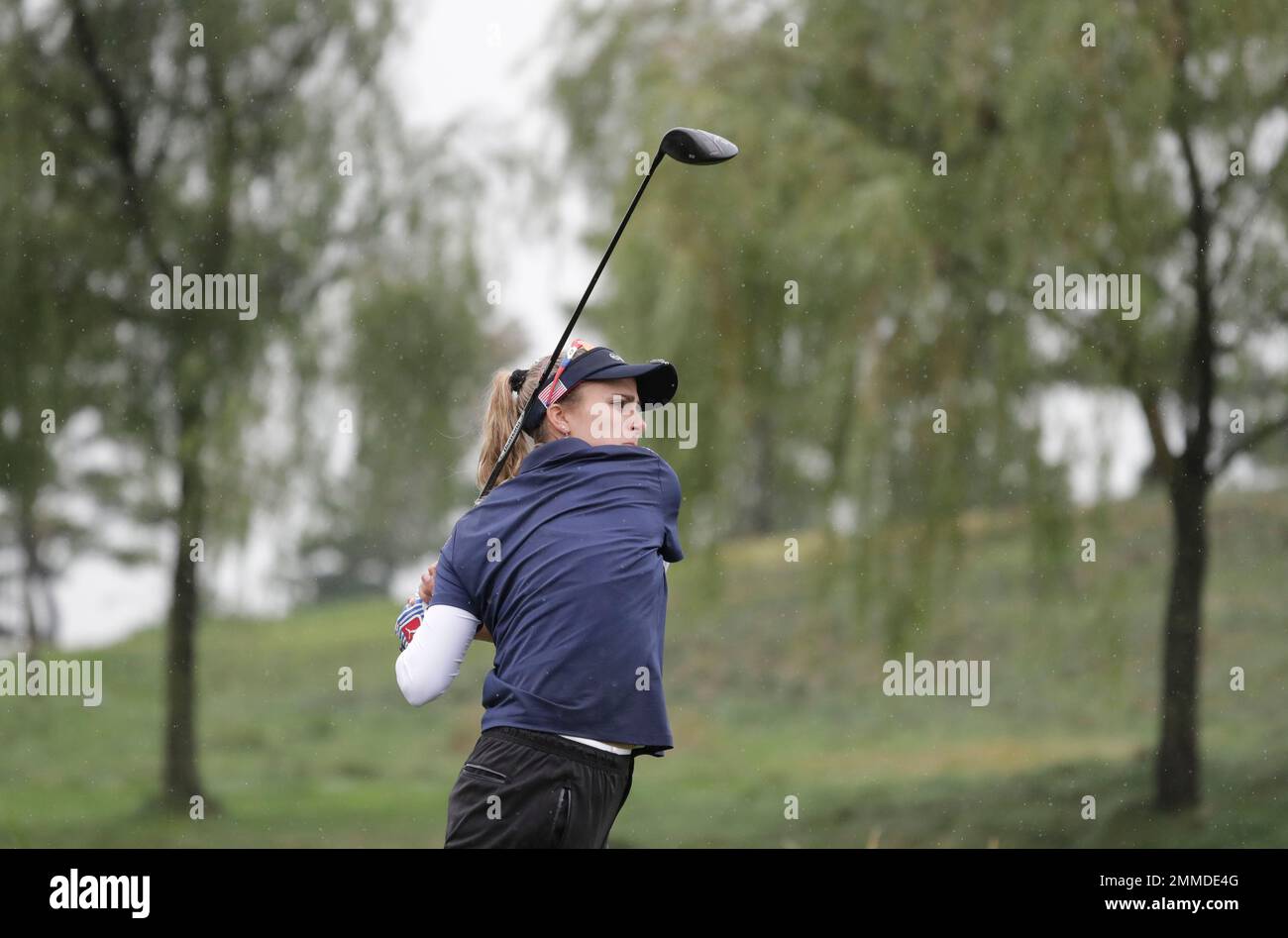 Lexi Thompson of the United States watches her shot on the third hole during the third round of