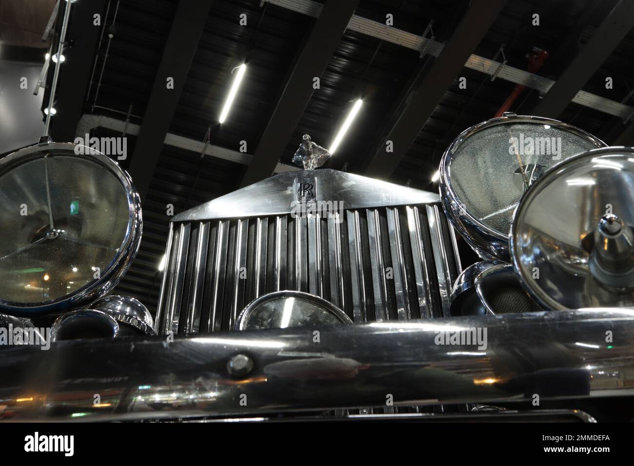 Vintage 1940s Rolls Royce radiator and head lamps viewed from below to ...