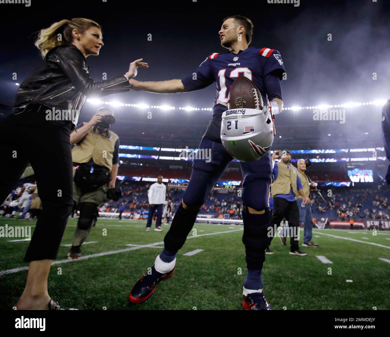 Fox Sports Network broadcaster Erin Andrews, left, speaks to New England  Patriots quarterback Tom Brady after an NFL football game against the  Indianapolis Colts, Thursday, Oct. 4, 2018, in Foxborough, Mass. (AP