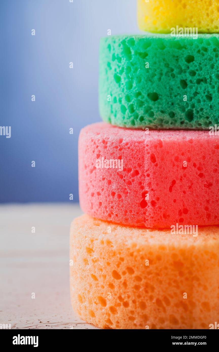 colorful sponges with soap bubbles for washing Stock Photo Alamy