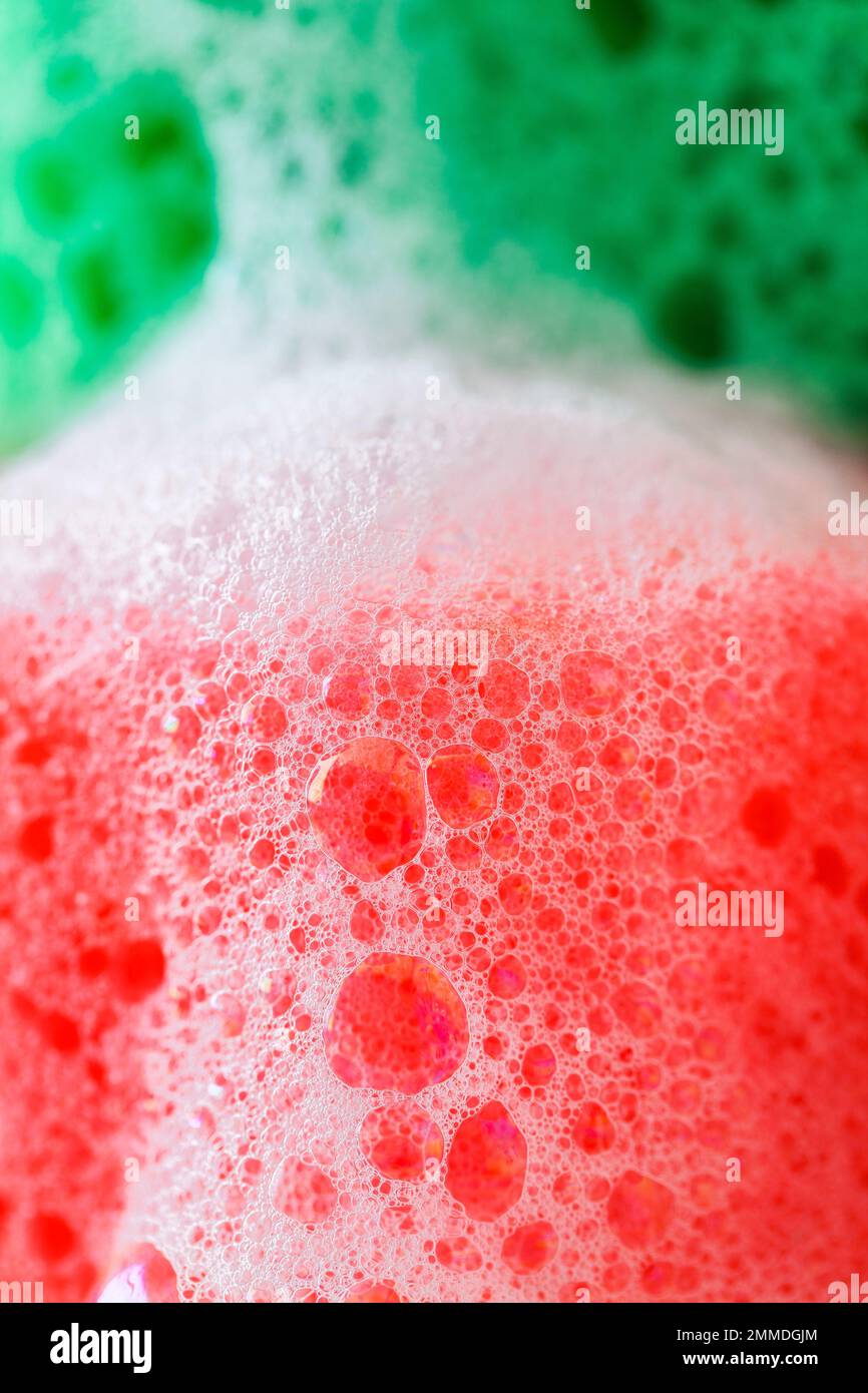 colorful sponges with soap bubbles for washing Stock Photo Alamy