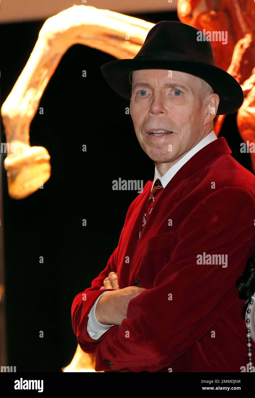 Gunther von Hagen poses in front of the sculpture 'Rearing Horse with