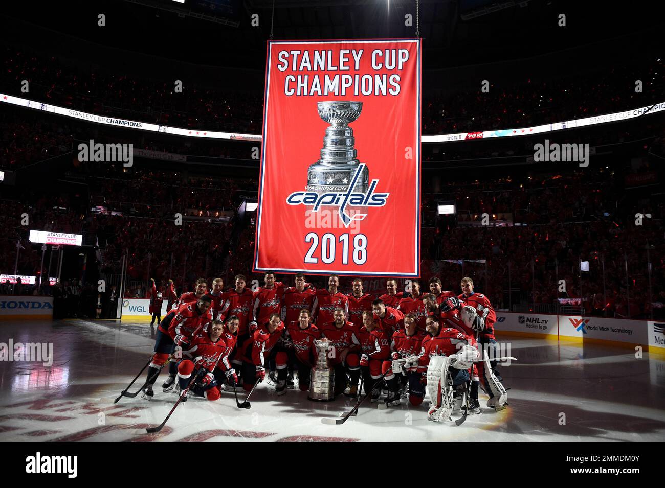 https://c8.alamy.com/comp/2MMDM0Y/the-washington-capitals-pose-under-the-stanley-cup-champions-banner-before-the-teams-nhl-hockey-game-against-the-boston-bruins-wednesday-oct-3-2018-in-washington-ap-photonick-wass-2MMDM0Y.jpg