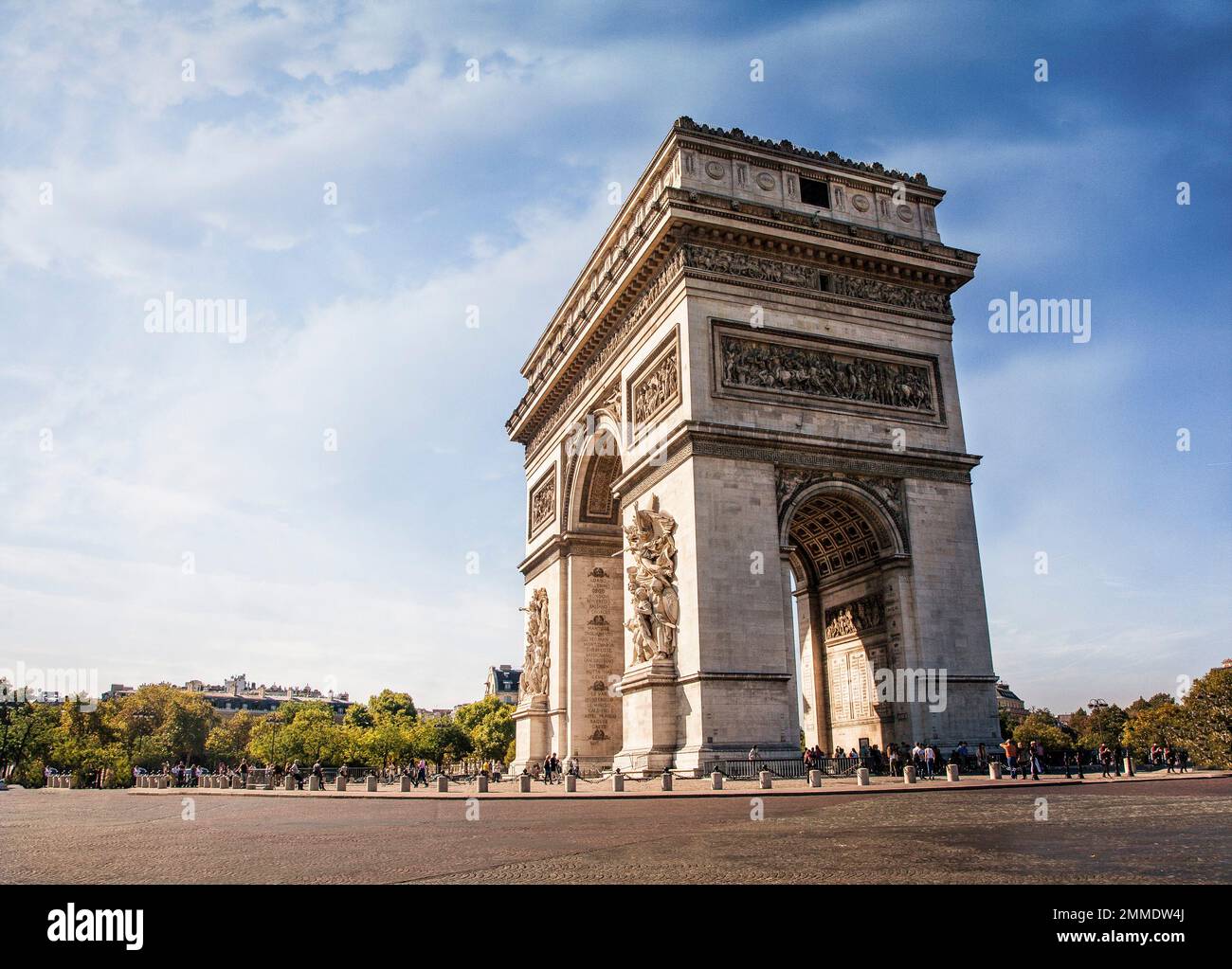 The Arc de Triomphe de l'Étoile rises proudly at the western end of the Champs-Élysées in Paris, France. Stock Photo