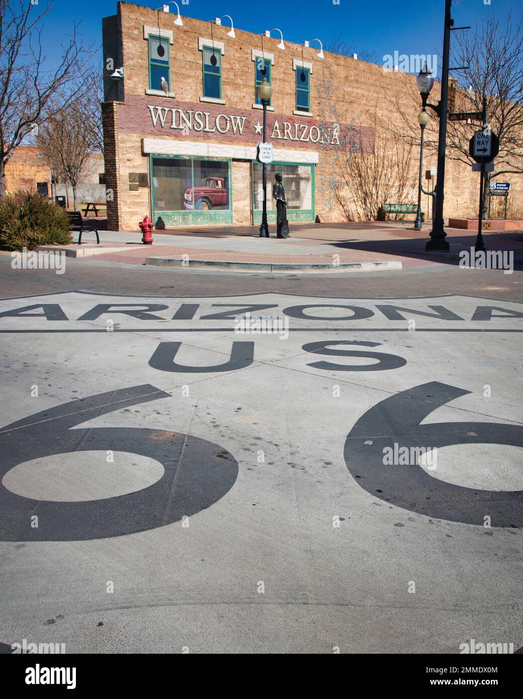 A celebration of a corner referenced by the music group Eagles song in Winslow, Arizona. Stock Photo