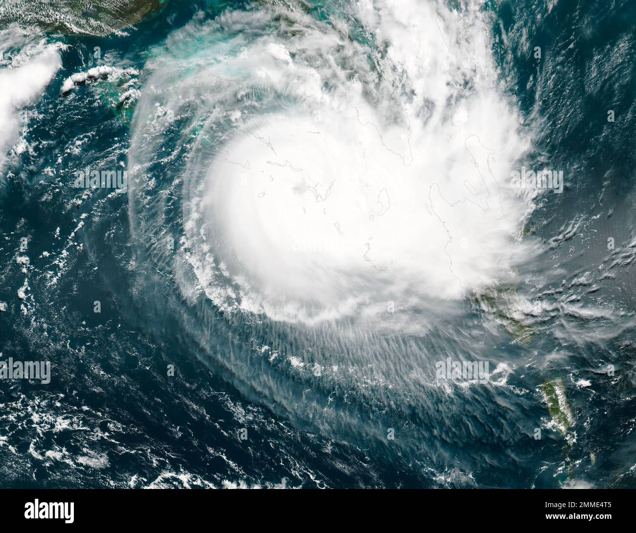 Hurricane from space, satellite view. Hurricane catastrophe. Elements of this image furnished by NASA. Selective focus. Noise and grain included Stock Photo