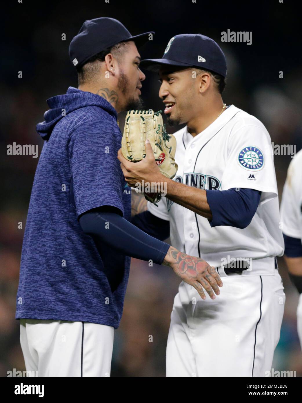 Seattle Mariners closing pitcher Edwin Diaz, right, is