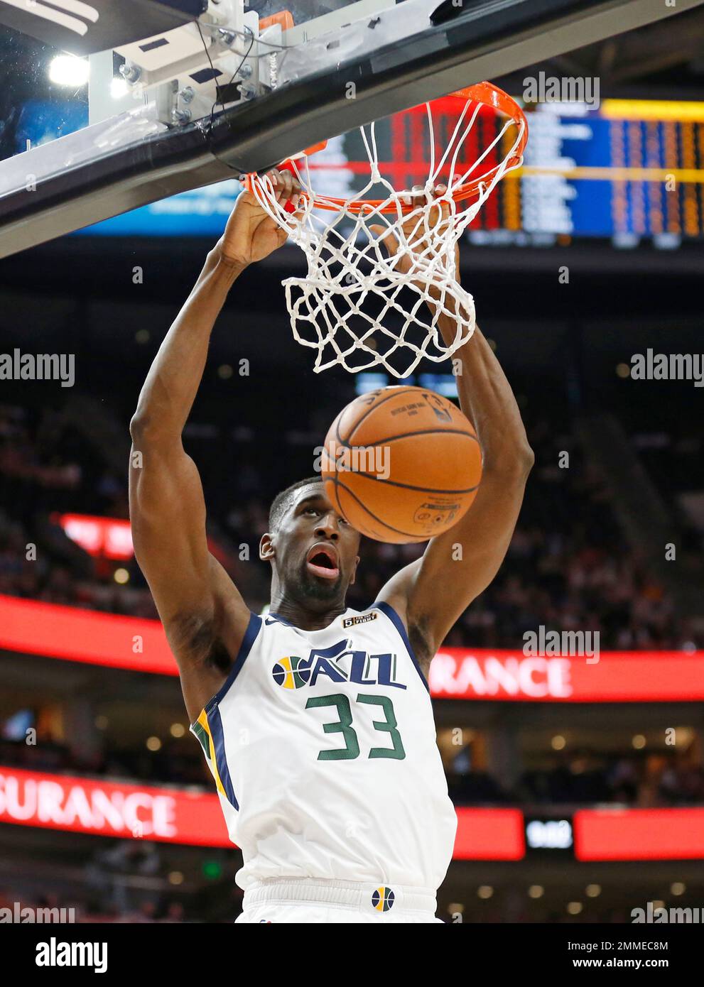 Utah Jazz center Ekpe Udoh (33) dunks the ball against the Perth Wildcats  in the second half during an NBA exhibition basketball game Saturday, Sept.  29, 2018, in Salt Lake City. (AP