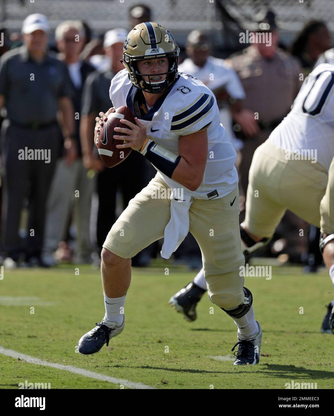 Pittsburgh quarterback Kenny Pickett scrambles as he looks for a