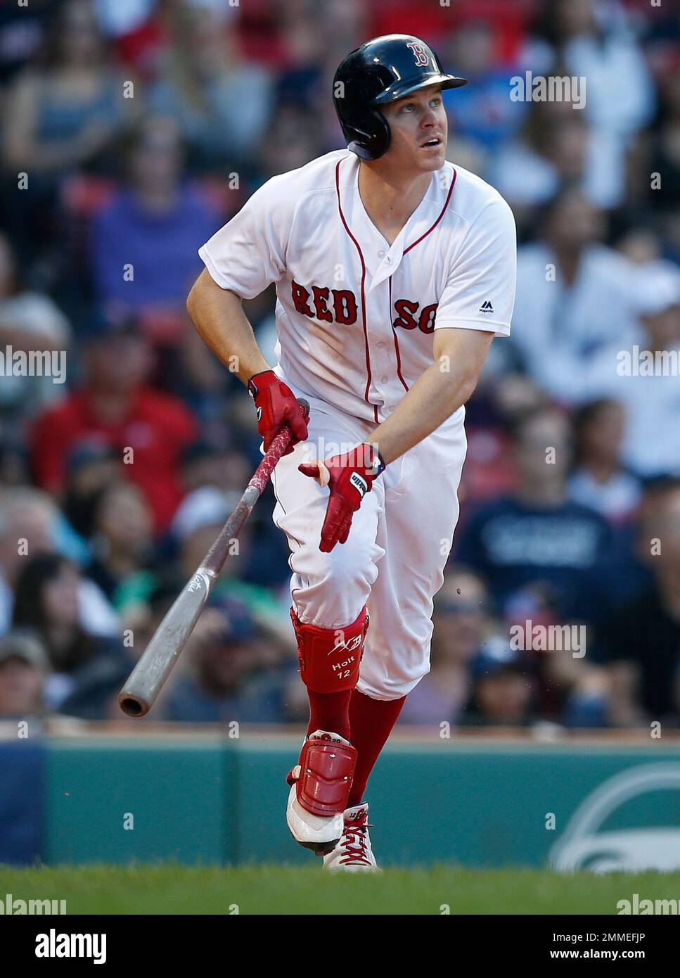 Boston Red Sox's Brock Holt watches his two-run home run during the ninth  inning of a baseball game against the New York Yankees in Boston, Saturday,  Sept. 29, 2018. (AP Photo/Michael Dwyer