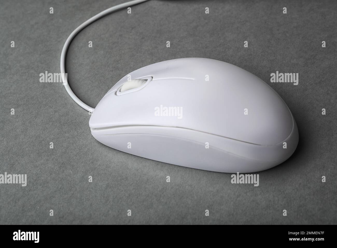 Modern wired computer mouse on grey background Stock Photo