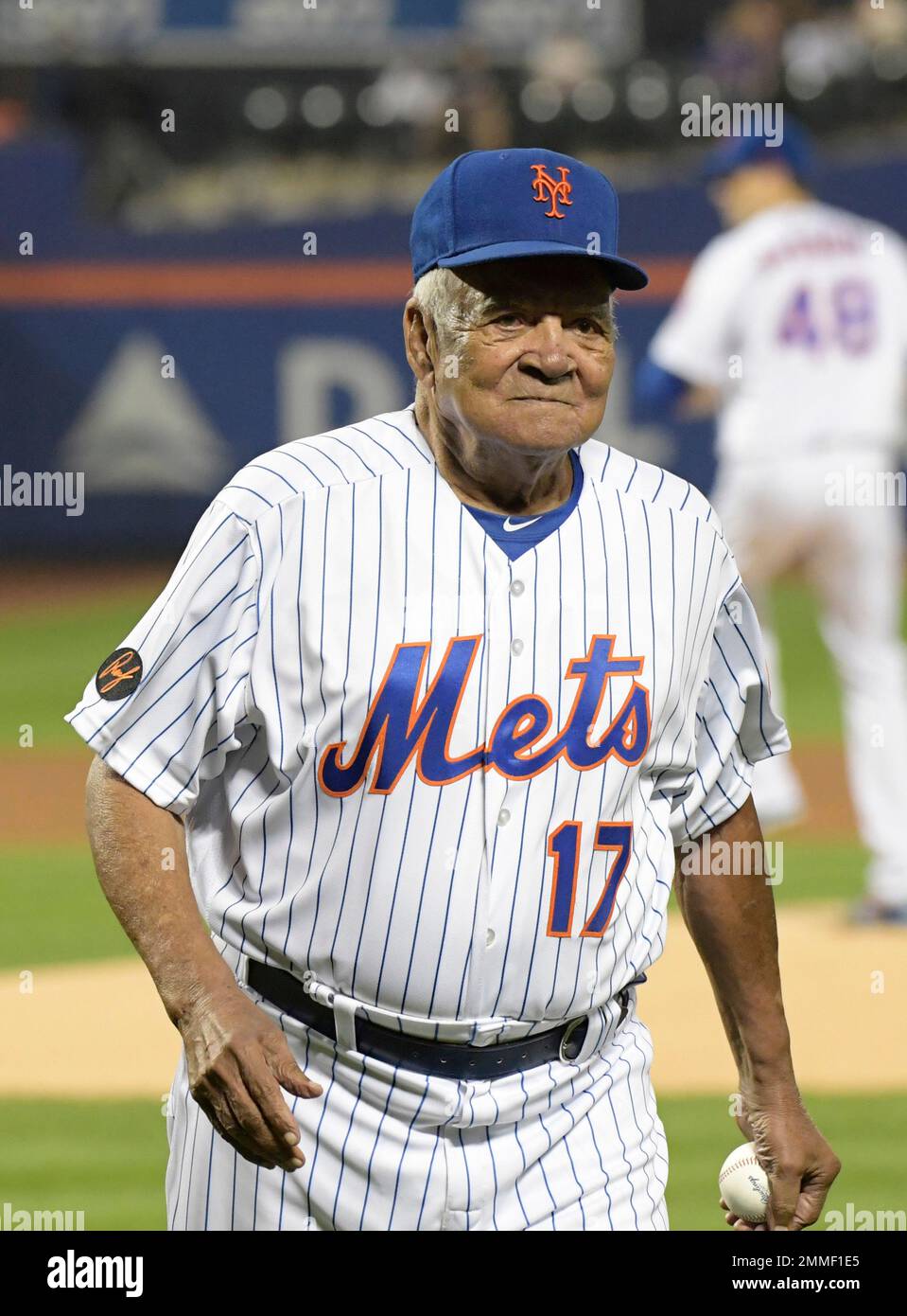 Former Major Leaguer Ozzie Virgil leaves the field after throwing out the  first pitch before a New York Mets baseball game against the Atlanta Braves  Wednesday, Sept. 26, 2018, in New York.