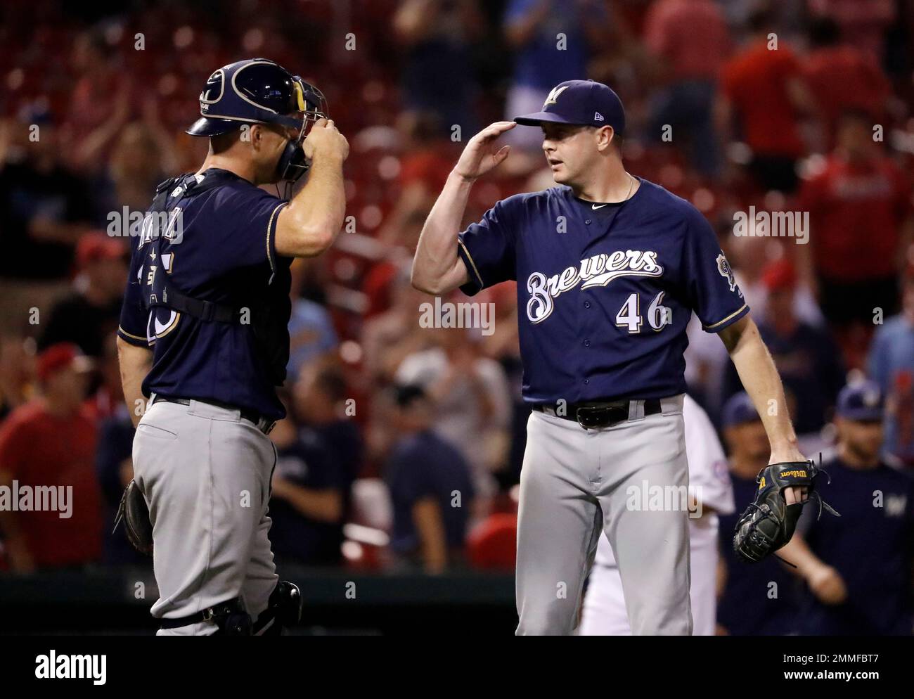 Milwaukee Brewers relief pitcher Corey Knebel, right, and catcher Erik