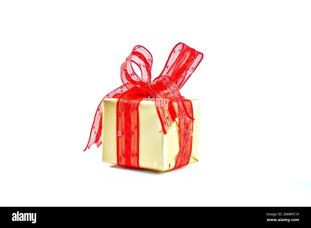 Gift box with red ribbon Stock Photo - Alamy