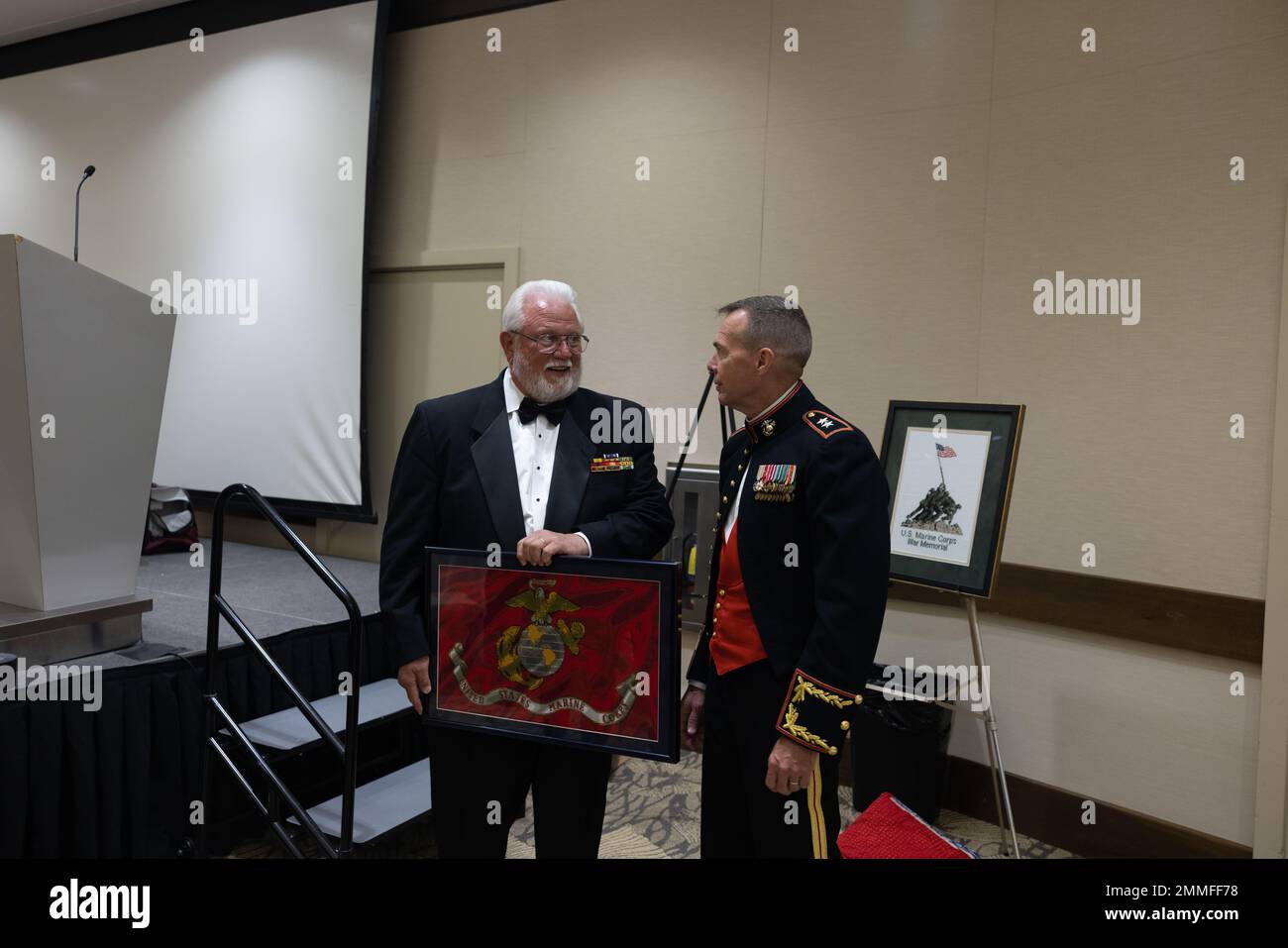 U.S. Marine Corps Maj. General Jay Bargeron, 3d Marine Division Commanding General, speaks with a veteran of “The Fighting Third”  at the 3d Marine Division Association banquet honoring the Division’s 80th Anniversary in San Diego, California, Sept. 17, 2022. The 3d Marine Division was activated at Camp Elliot, San Diego, Sept. 16, 1942 and has taken part in combat operations from World War II and Vietnam through Iraq and Afghanistan. The current Marines of 3d Marine Division continue to build on this legacy today as a critical part of the stand-in force within the first island chain of the In Stock Photo