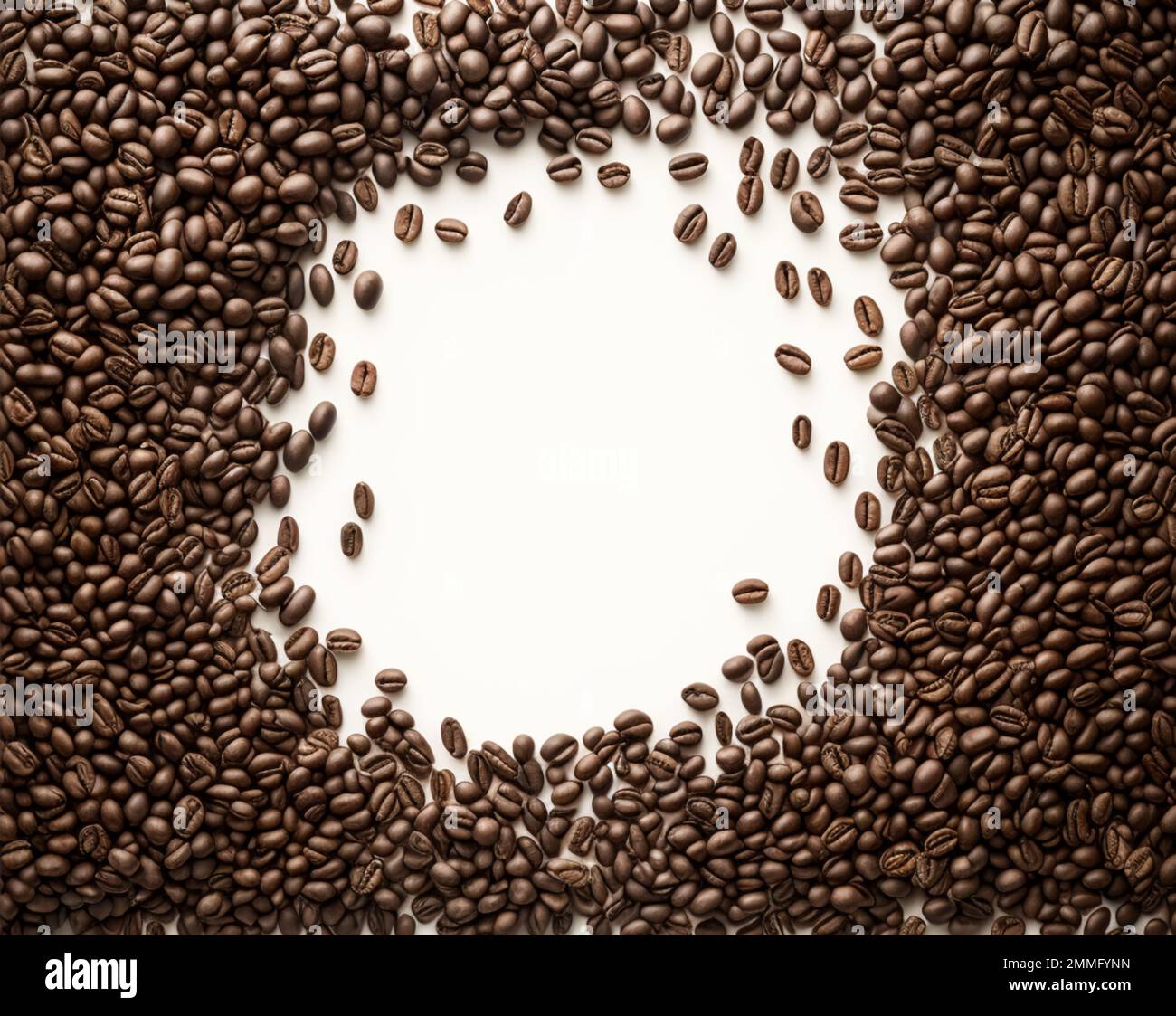 coffee beans isolated on a white background with a blank copy space in the middle represents the rich, bold flavor of the beloved beverage Stock Photo