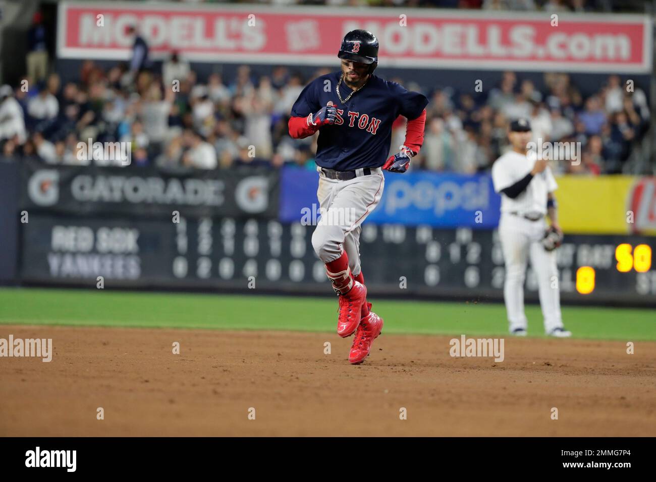 Boston Red Sox s Mookie Betts Runs The Bases After Hitting A Three run boston-red-sox-s-mookie-betts-runs-the-bases-after-hitting-a-three-run