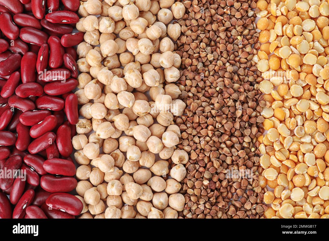 Different types of legumes and cereals as background, top view. Organic grains Stock Photo Alamy