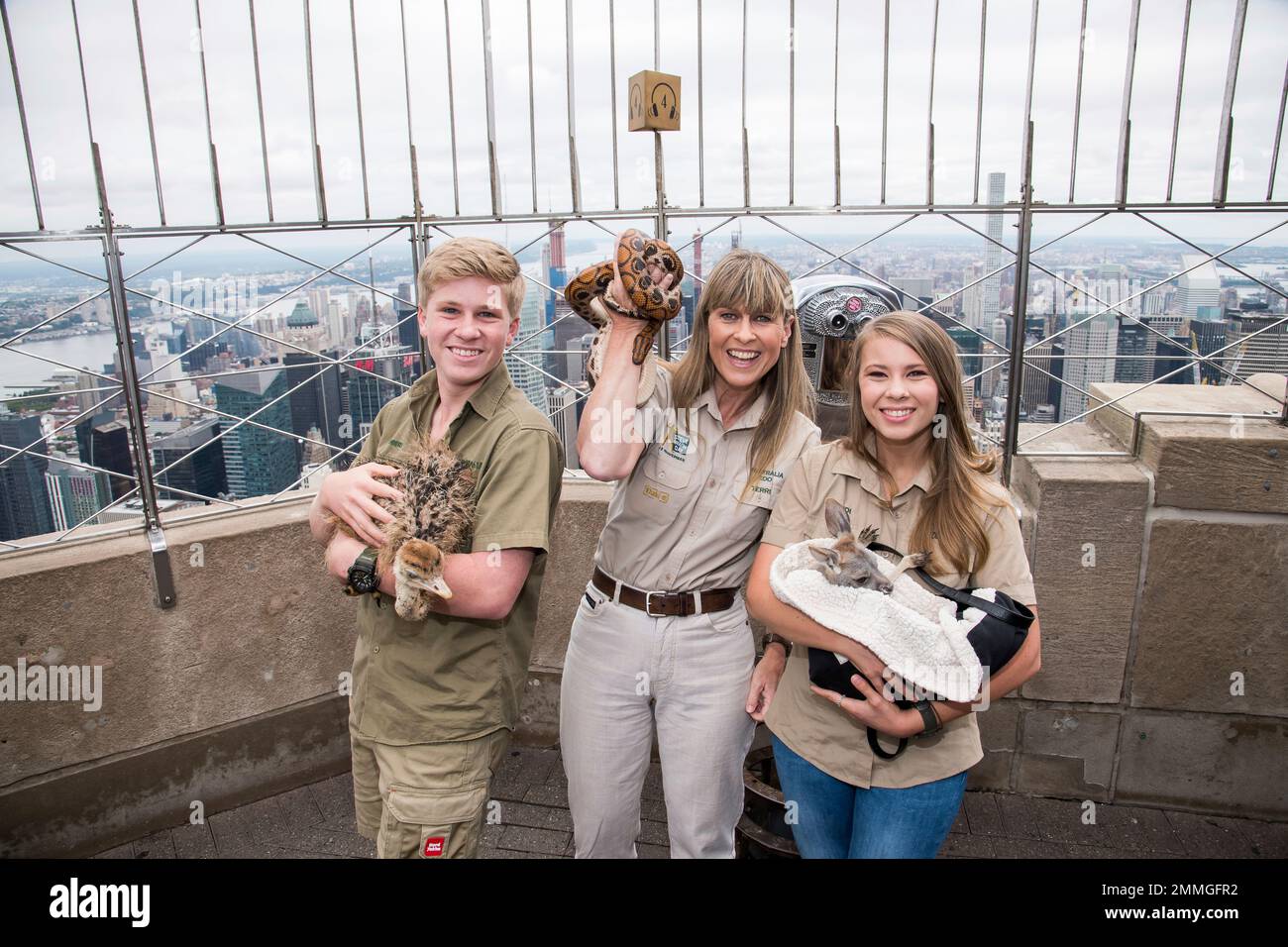 Robert, from left, Terri and Bindi Irwin visit the 86th floor ...