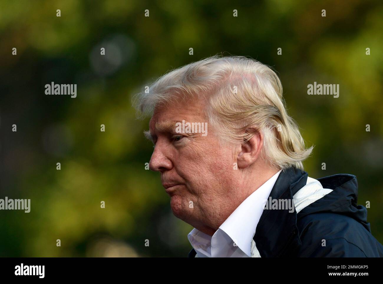 President Donald Trump walks across the South Lawn of the White House ...