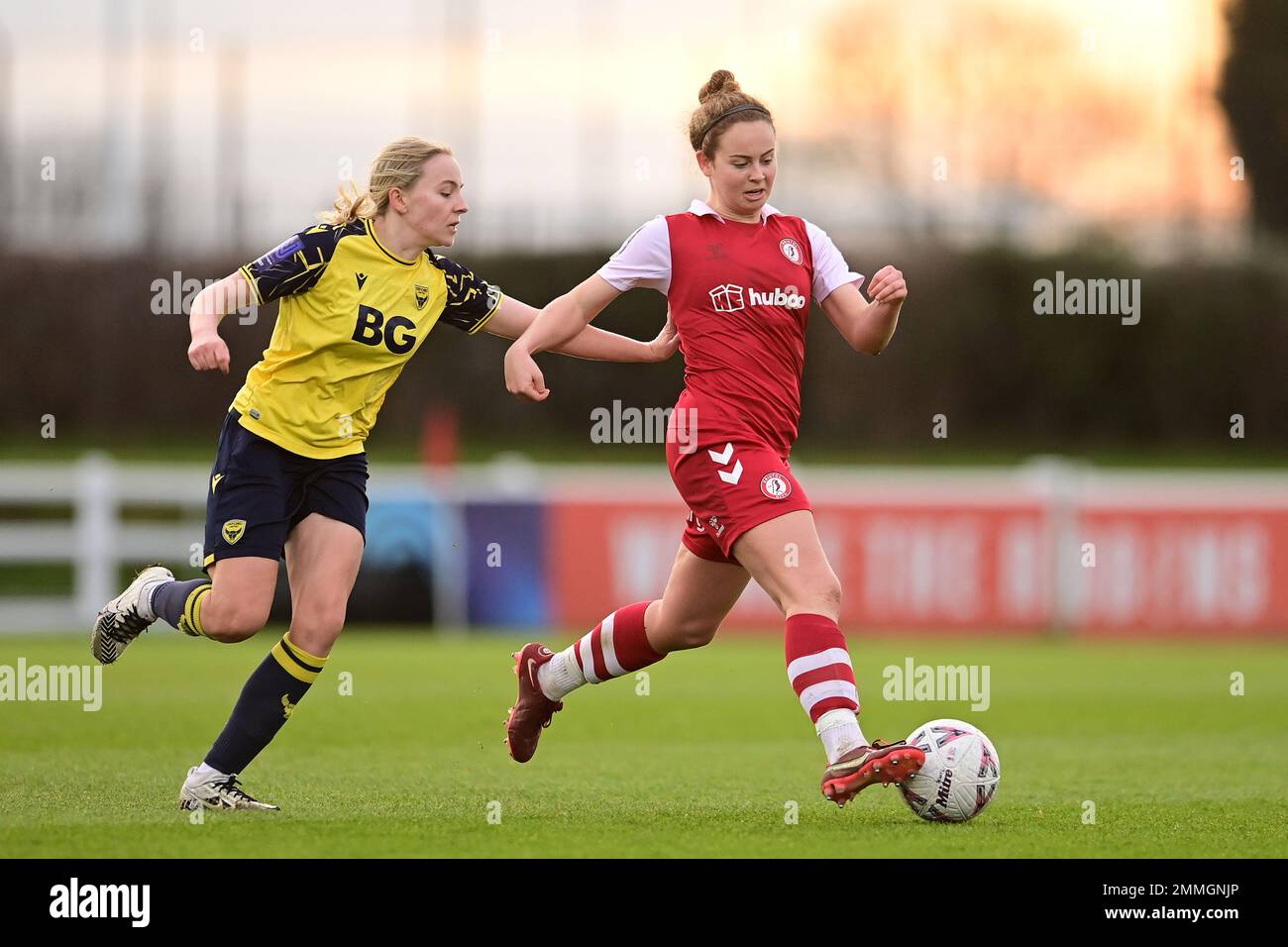 Bristol, UK. 29th January, 2023. Emily Syme of Bristol City Women under pressure from Carly Johns of Oxford United W.F.C. - Mandatory by-line: Ashley Crowden  - 29/01/2023 - FOOTBALL - Robins High Performance Centre - Bristol, England - Bristol City Women vs Oxford United Women - The Women's FA Cup - Fourth Round Credit: Ashley Crowden/Alamy Live News Stock Photo