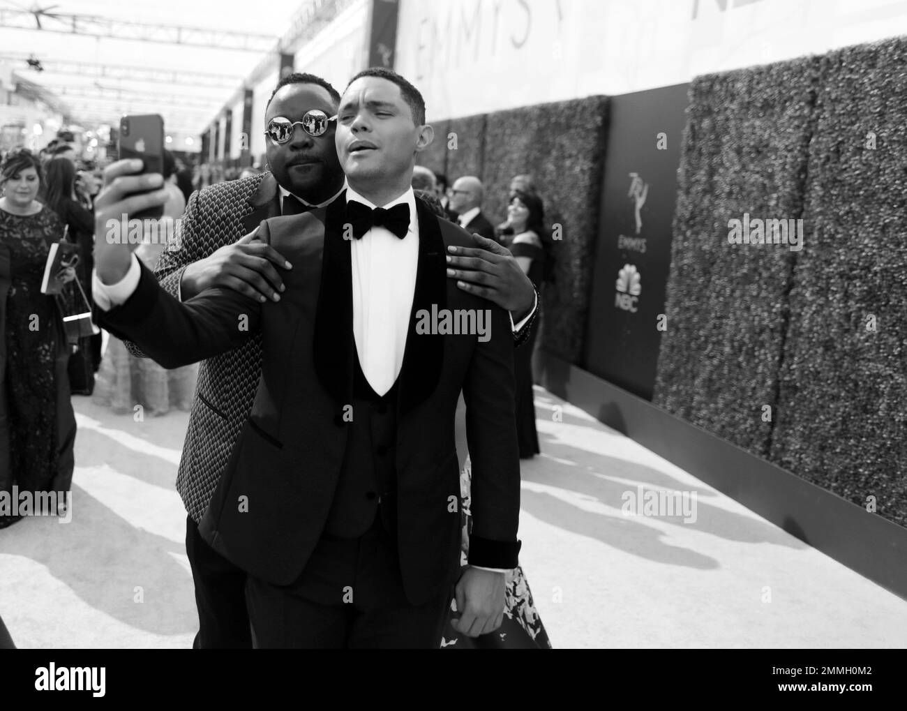 Brian Tyree Henry, left and Trevor Noah arrive at the 70th Primetime