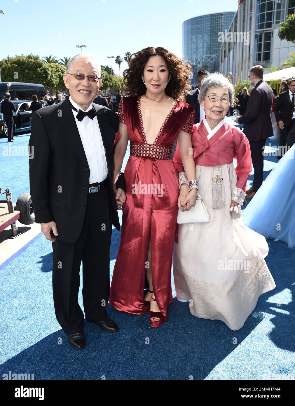 EXCLUSIVE JoonSoo Oh, from left, Sandra Oh, and YoungNam Oh arrive