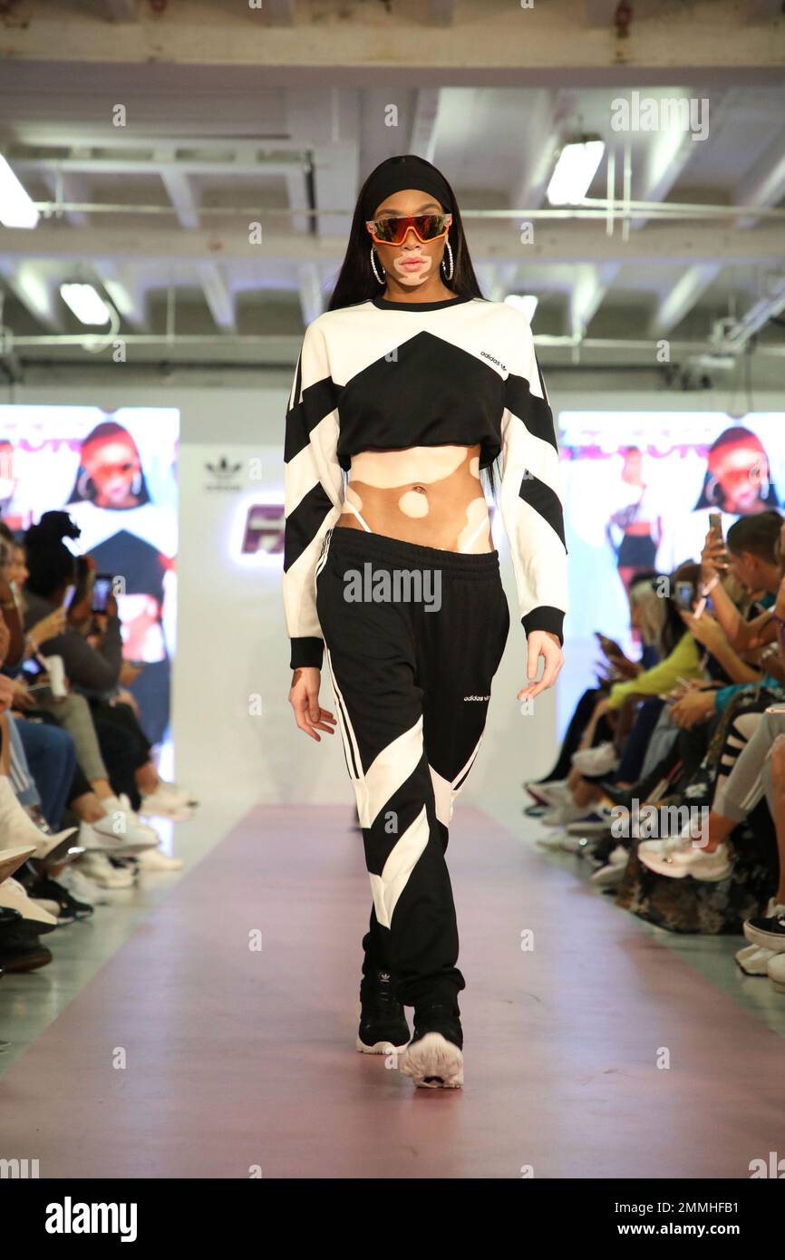 Winnie Harlow wears a creation by Hailey Baldwin for Adidas during their Spring/Summer 2019 runway show at Fashion Week in London, Monday, Sept. 17, 2018. (Photo Vianney Le