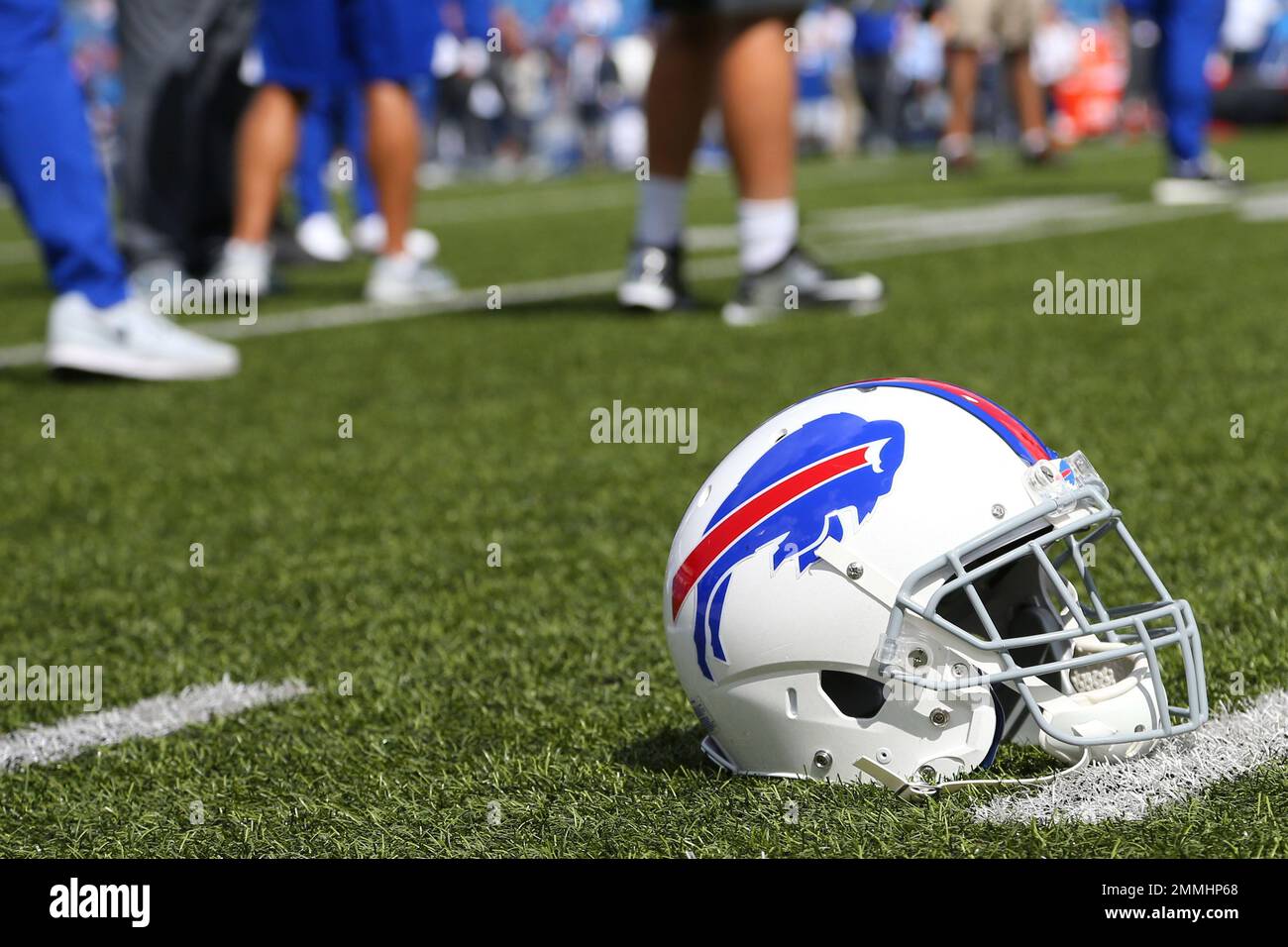 A Buffalo Bills helmet sits on the field before an NFL football game  between the Buffalo Bills and the Los Angeles Chargers, Sunday, Sept. 16,  2018, in Orchard Park, N.Y. (AP Photo/Rich