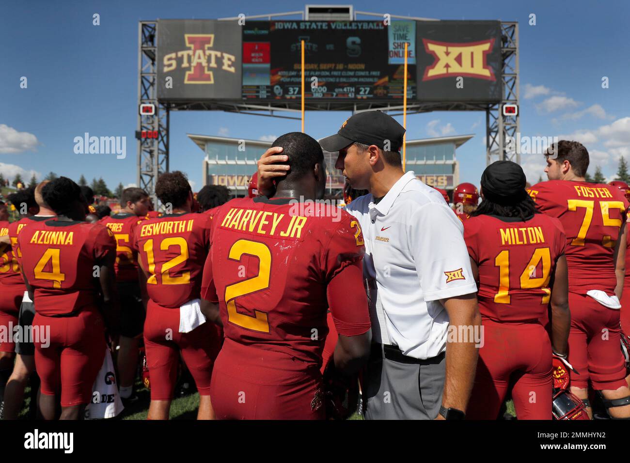Iowa State head coach Matt Campbell, right, pulls Iowa State linebacker