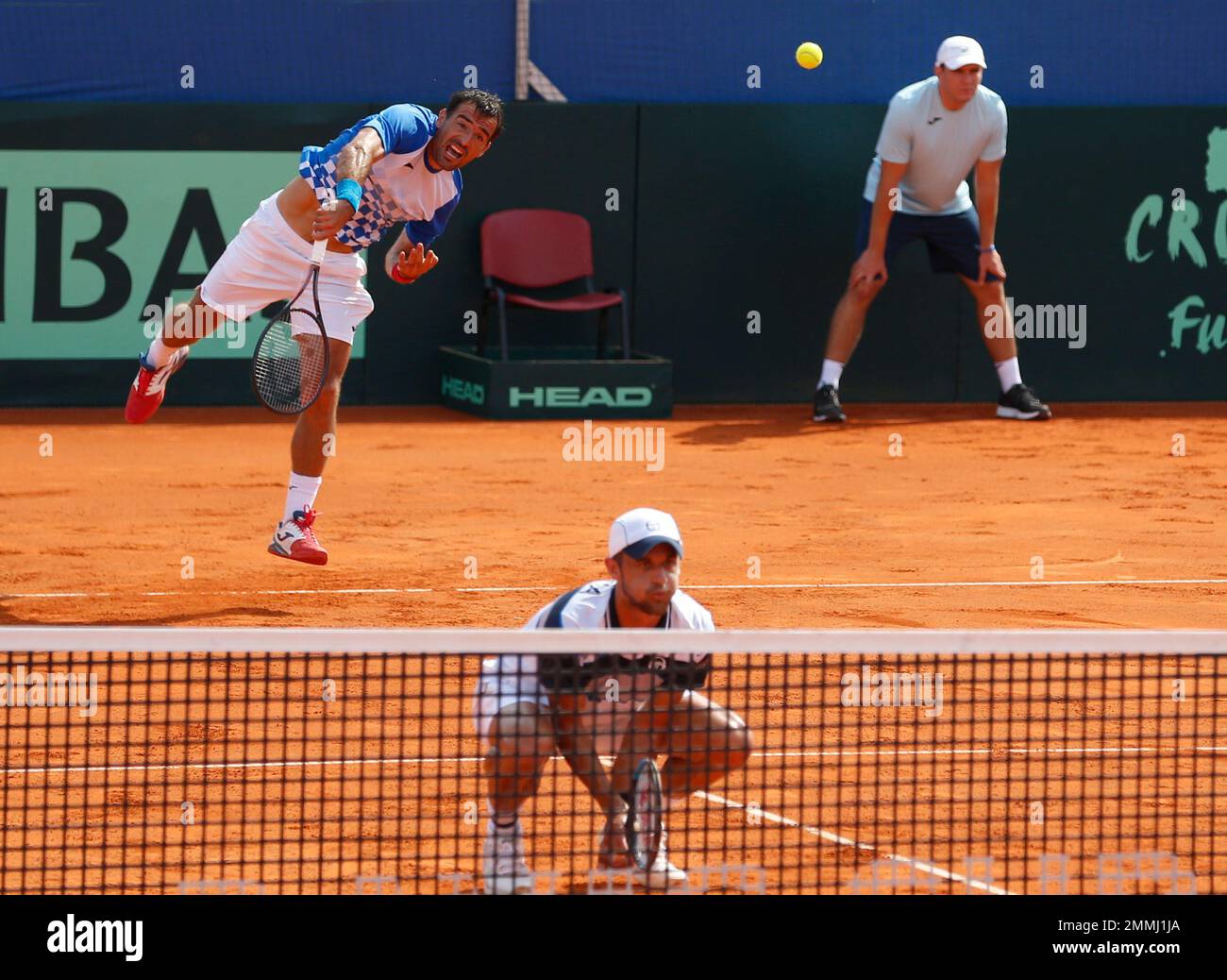 Croatia's Ivan Dodig, left and Mate Pavic play their Davis Cup