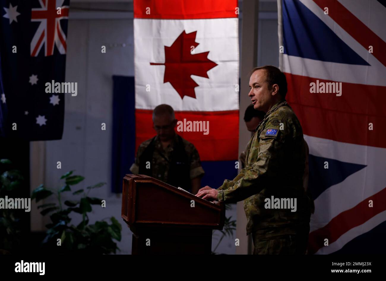 Royal Australian Air Force, Lt. Col. Scott, speaks at a service ...