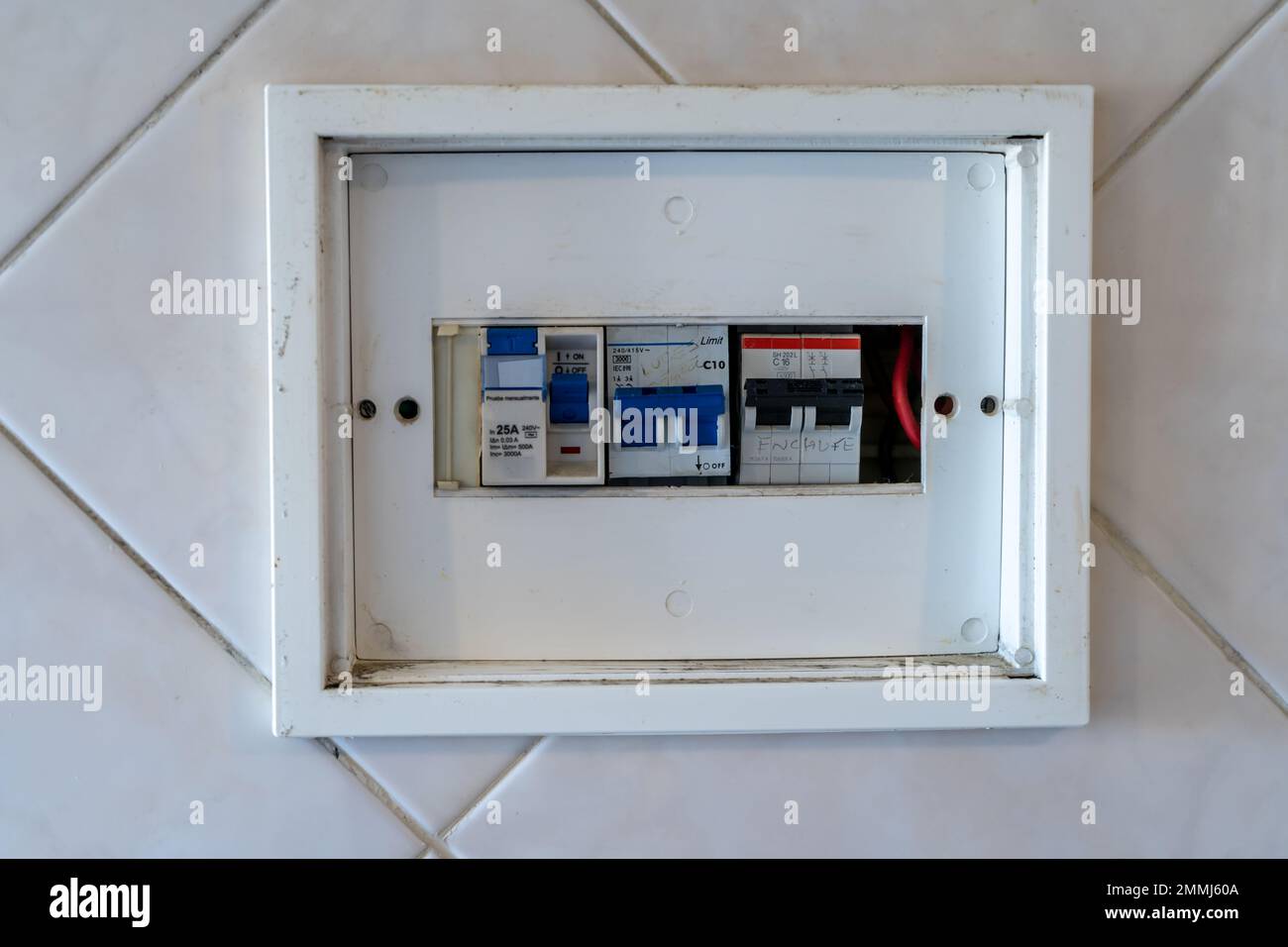 A Light box with circuit breakers and thermal switches. Stock Photo